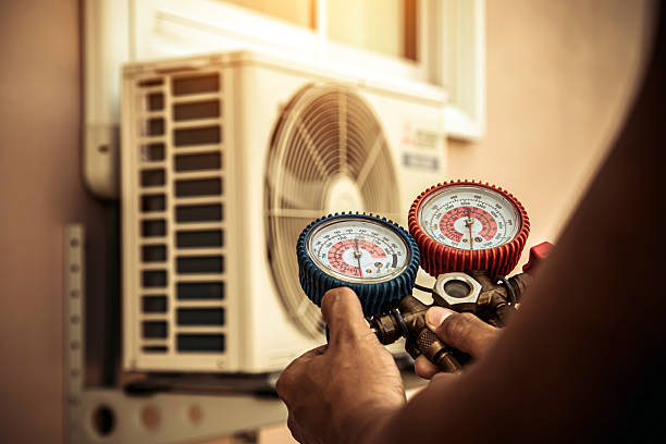 Professional Air Conditioning Service technician working in Brice, OH